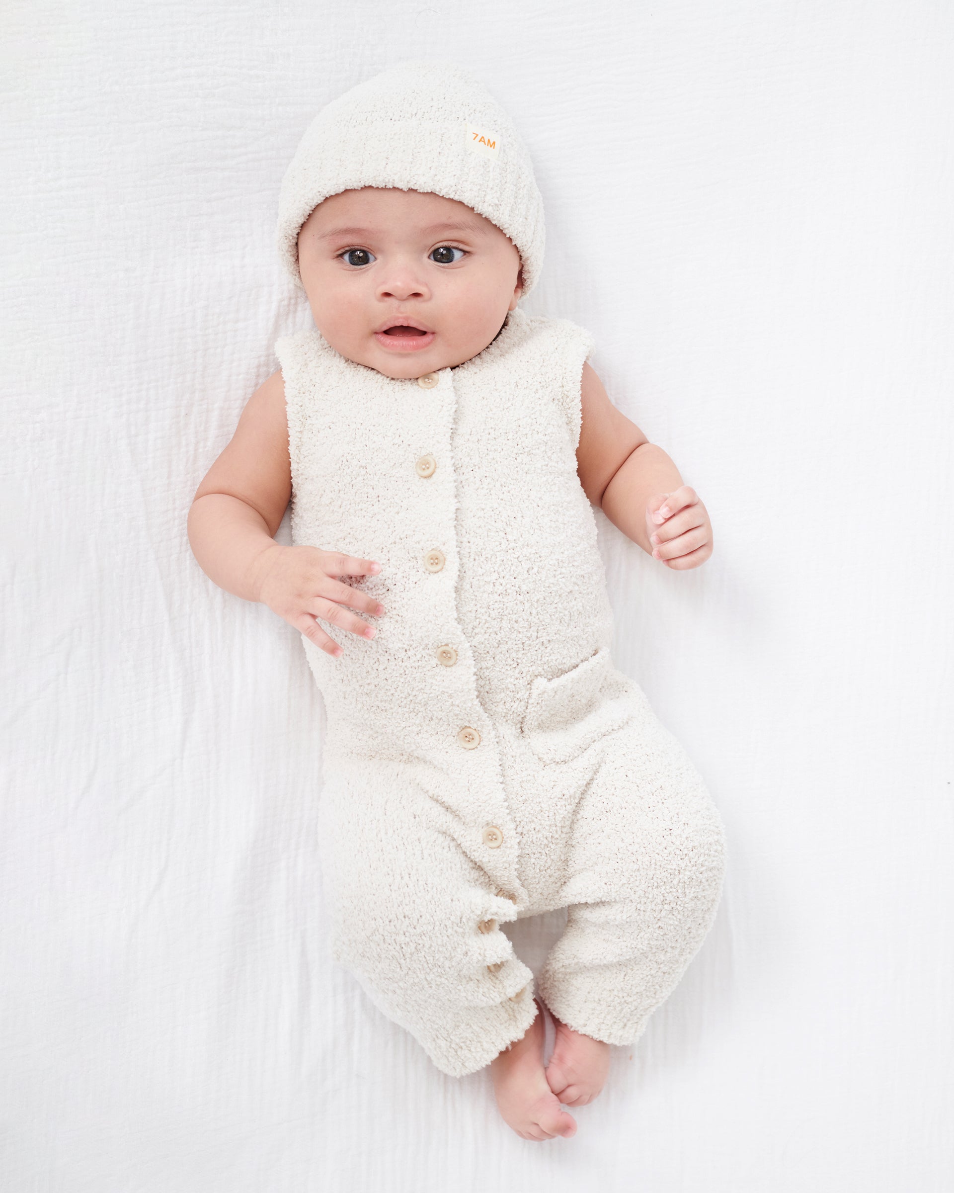 White top newborn romper